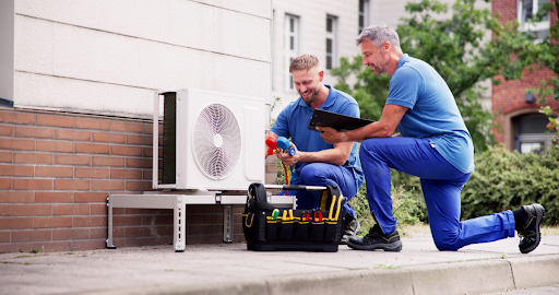 An AC inspection being performed by trained HVAC service technicians