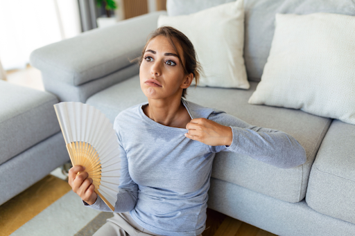 Woman dealing with hot & cold spots in her home
